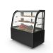 Vitrine réfrigérée présentant une sélection de pâtisseries et de desserts individuels.